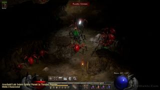 Arachnid Lair below Spider Forest in Torajan Jungles as seen in Diablo 2 Resurrected.  Flame Spider and Poison Spinners attack the Sorceress and her Mercenary.