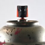 aerosol-spray-can-with-paint-splatter-royalty-free-image-1587500021.jpg